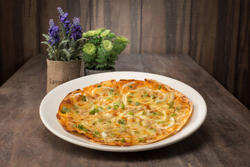 Fast food. Seafood Pizza. Western Food. Pizza. Onion. Cheese. Seafood. Close up of pizza. Café or restaurant background. Dinner or lunch.