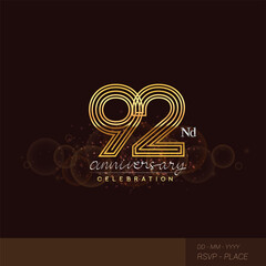 92nd anniversary logotype with glitter and shiny golden colored isolated on elegant background.