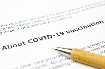 About COVID-19 vaccination with wooden pen