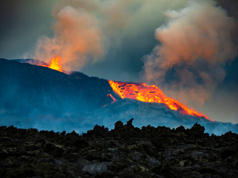 Glowing lava is ejected skyward as lava spills from Fagradalsfjall Volcano, Iceland