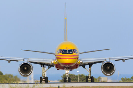 Luqa, Malta September 1, 2017: DHL (European Air Transport - EAT) Boeing 757-236(SF) [D-ALEH] lining up runway 31 for take off in the evening.
