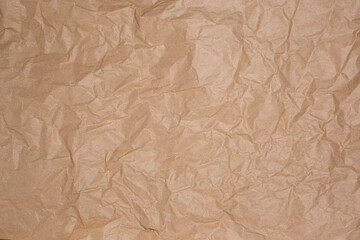 Crumpled craft brown paper, craft texture background