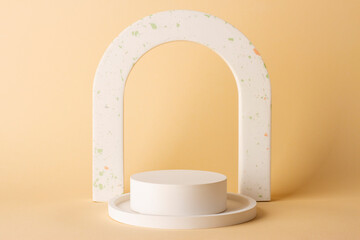 Composition with concrete arch and cylinder in the style of minimalism on a delicate background