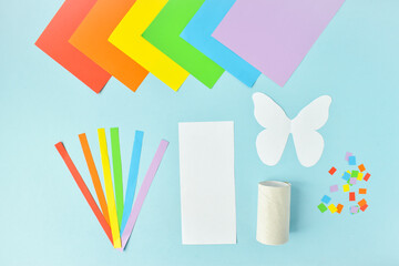 DIY. A paper butterfly made of colored paper. LGBT craft. Step-by-step instructions. Step 1. Cut out the details.