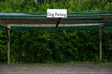 Fototapeta premium Dog parking zone sign in shop car park