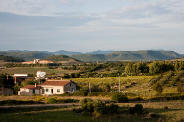 Naklejka premium landscape with houses and farm in mountains