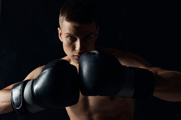 guy with boxing gloves pumped up torso bodybuilder fitness 