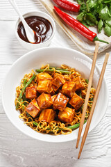 asian noodle bowl with hoisin baked tofu cubes