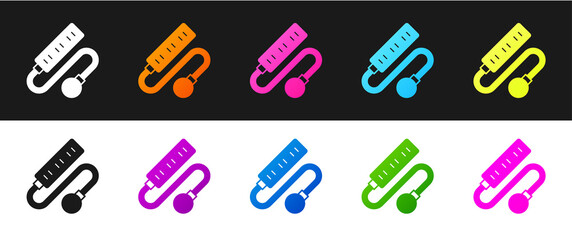 Set Electric extension cord icon isolated on black and white background. Power plug socket. Vector