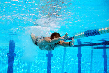 Swimmer in the big swimming pool