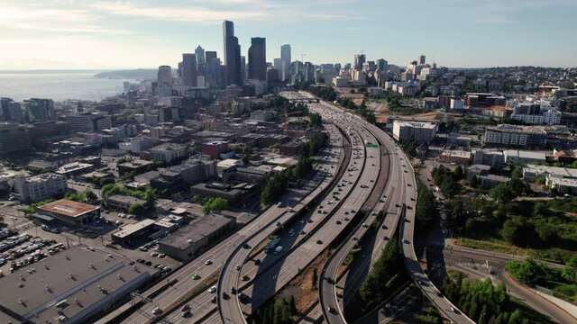 High Aerial of Seattle Cityscape with Tall Skyscraper Buildings and Intersecting Freeway