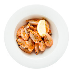 Isolated bowl of shrimps appetizer with lemon on white background