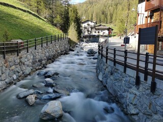 The little creek Evançon in the little town of Saint Jacques in Ayas valley, Valle D'Aosta, Italy