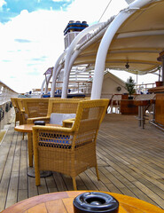 Terrace or patio or balcony on outdoor deck of luxury cruiseship cruise ship liner with deck...
