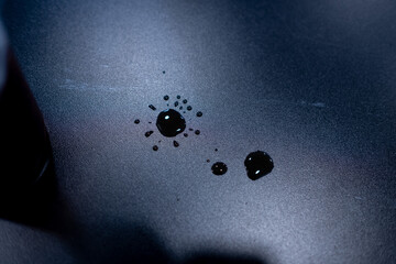 water droplet on wood table, water stain