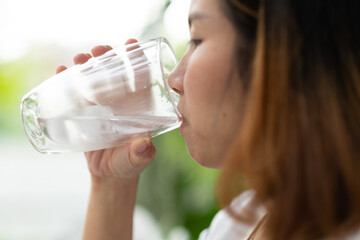 woman drinking fresh water, healthcare concept