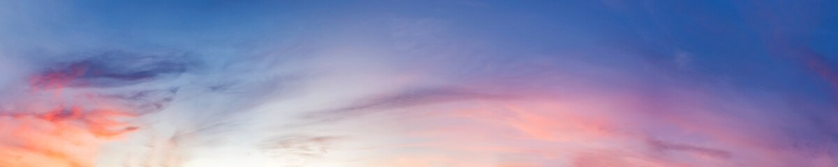 Obraz premium Panorama of Dramatic vibrant color with beautiful cloud of sunrise and sunset. Panoramic image..
