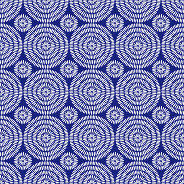 Seamless african shweshwe pattern. Blue and white print for textiles. Polka dot ornament. Vector illustration.