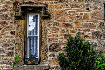 Fototapeta na wymiar Detail of a window house in village of Ford and Etal in County of Northumberland