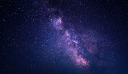 Naklejka na ściany i meble Colored Milky Way. Night landscape of starry sky.