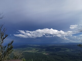 Green valley blue sky gods window Lush greenery clouds