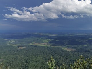 Green valley blue sky gods window Lush greenery clouds