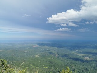 Green valley blue sky gods window Lush greenery clouds
