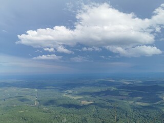 Green valley blue sky gods window Lush greenery clouds
