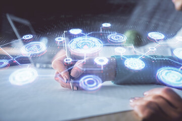 Double exposure of social network theme drawing over people taking notes background. Concept of human connection