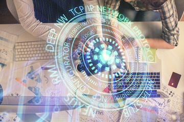 Double exposure of man and woman working together and data theme hologram drawing. Computer background. Top View.