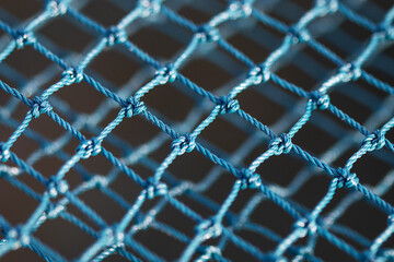 green nylon rope mesh background.