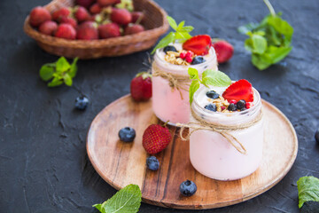 Healthy smoothie of fresh summer berries. Creative atmospheric decoration