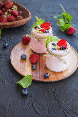 Healthy smoothie of fresh summer berries. Creative atmospheric decoration