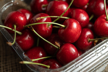 Fresh cherries on a wooden background