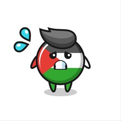 Obraz premium palestine flag badge mascot character with afraid gesture