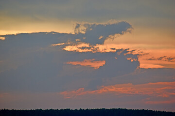 Red sunset with blue clouds in the evening