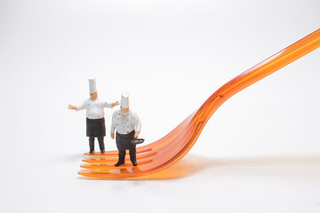 the fun of mini chefs or cooks on a fork