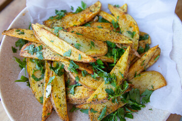 French fries, chips, finger chips, French-fried potatoes, or simply fries are batonnet or allumette-cut deep-fried potatoes, originating from either Belgium or France.