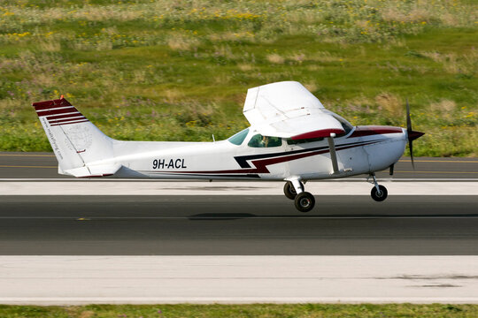 Luqa, Malta February 20, 2016: Malta School of Flying Cessna 172M Skyhawk [9H-ACL] doing pilot training circuits on runway 31.