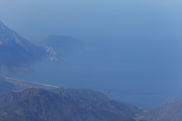 view from mountain ridge to sea bay