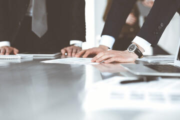 Business people using tablet computer while working together in a modern office. Teamwork concept