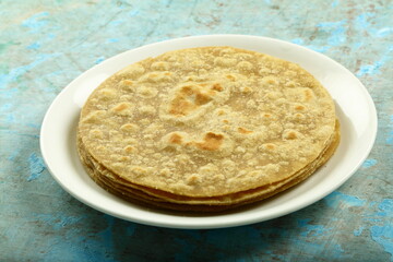 Chapati- The famous Indian flat bread made of what flour.