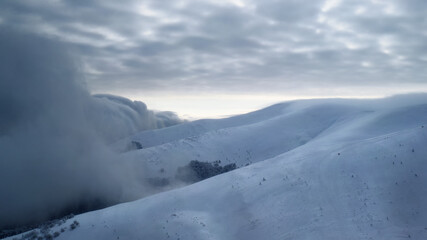 Fototapeta na wymiar snow storm mountains ski resort natural disaster