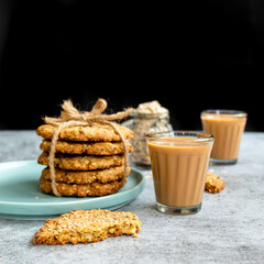 Multigrain Cookies with Glass of Tea  - styled with jar of oatmeal