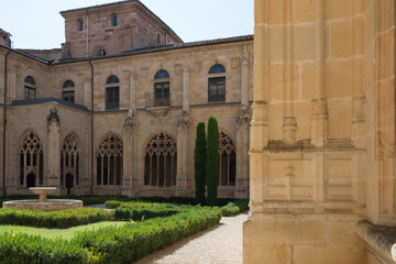 Beautiful archade and garden at San Salvador Monastery at Ona, Merindades, Burgos, Spain, Europe