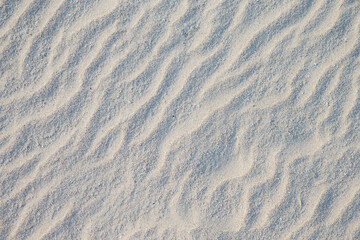 Fototapeta na wymiar sand pattern of a beach in the summer