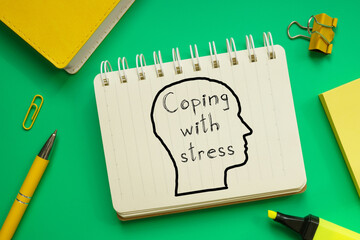 Coping with stress is shown on the business photo using the text