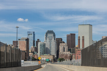 entering Boston by interstate with blue sky and skyline