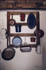 Very old frying pans, saucepans, pots and kitchen tools
