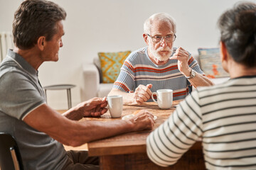 Senior people discussion something at the cup of tea at the table